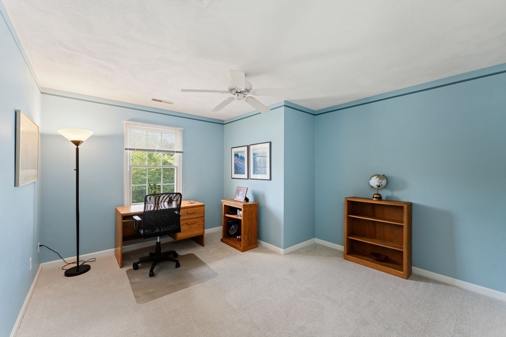 5 Spring House Lane Cumberland, RI 02864 - Photo 16 of 34 a view of a workspace with furniture and a window