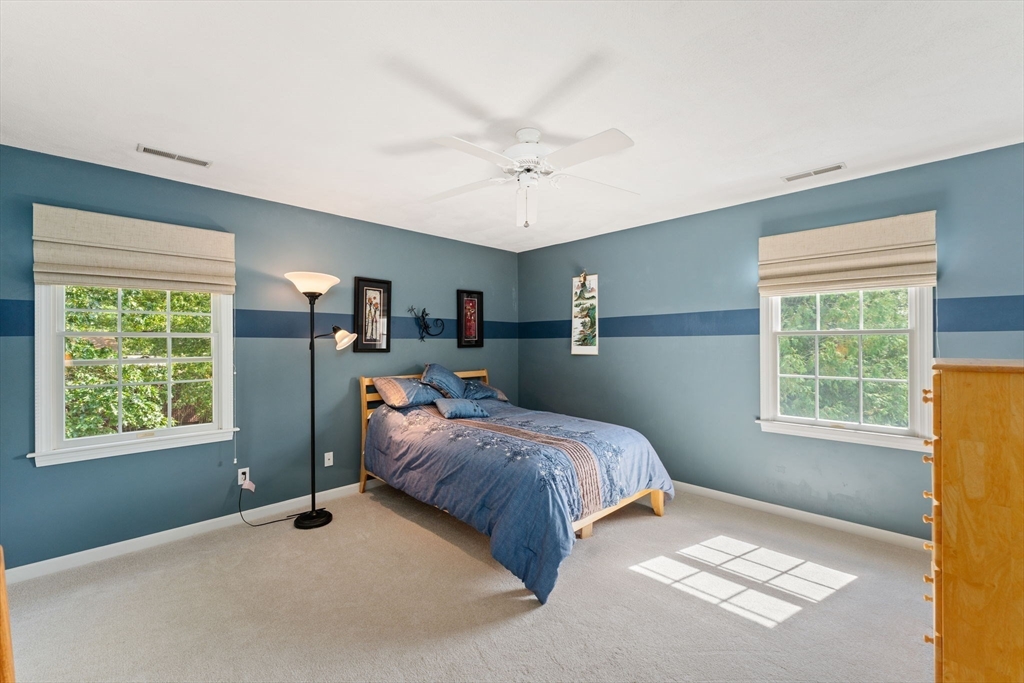 5 Spring House Lane Cumberland, RI 02864 - Photo 17 of 34 a bed room with a bed and a window