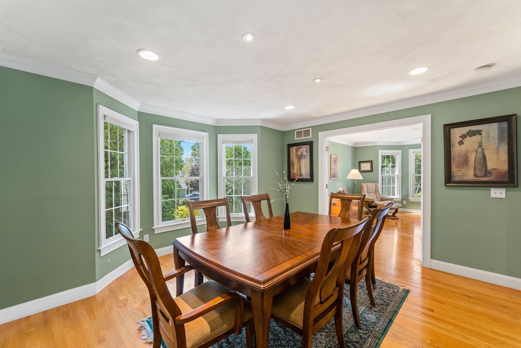 5 Spring House Lane Cumberland, RI 02864 - Photo 4 of 34 a dining room with furniture and wooden floor