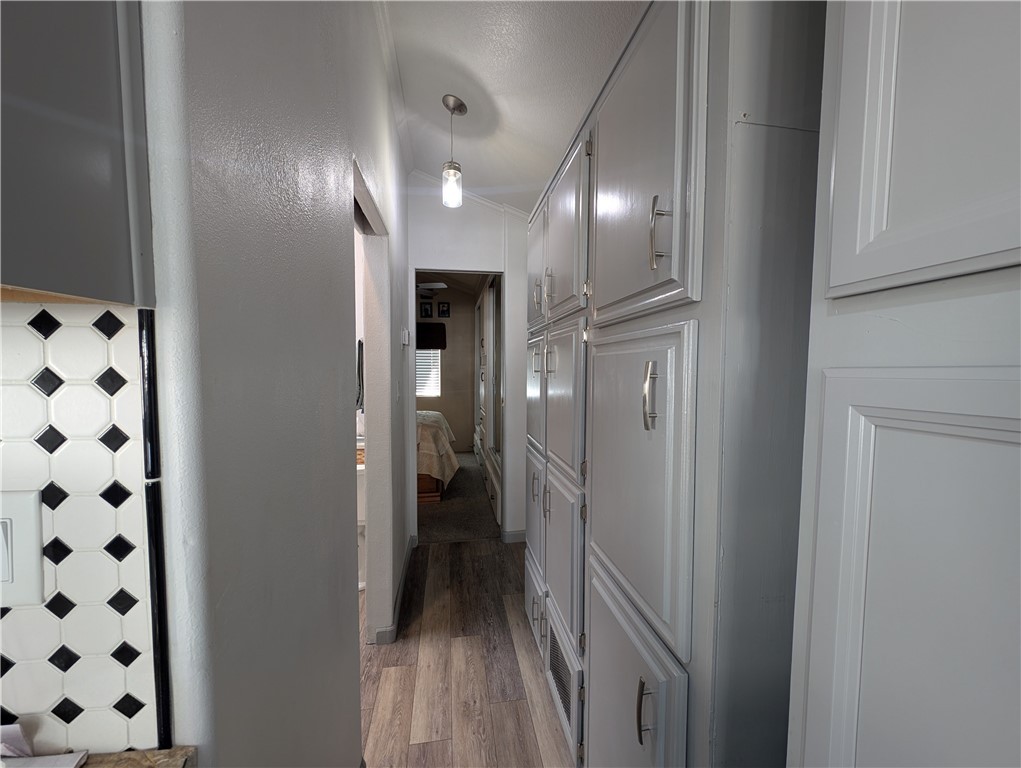 2000 Ramar Road, Unit 442 Bullhead City, AZ 86442 - Photo 24 of 28 Corridor featuring light wood-style floors