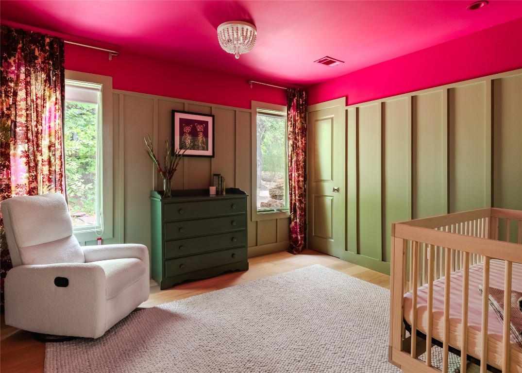 4203 Afton Lane Austin, TX 78744 - Photo 18 of 24 a bedroom with a bed and window