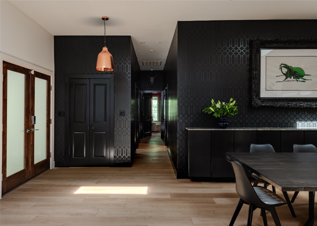 4203 Afton Lane Austin, TX 78744 - Photo 3 of 24 a view of a dining room with furniture and wooden floor