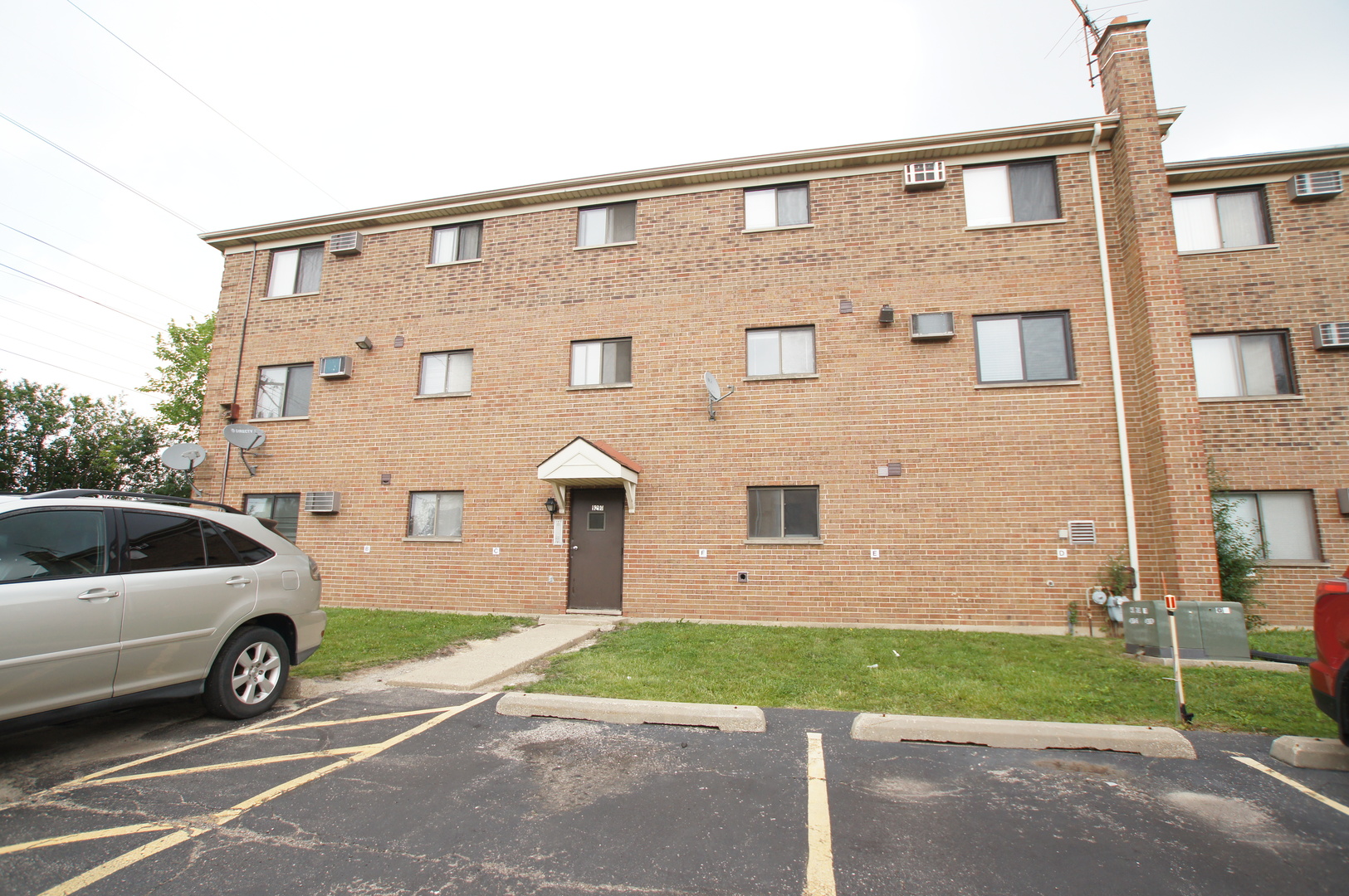 9290 Hamilton Court, Unit A Des Plaines, IL 60016 - Photo 10 of 10 a view of a house with a yard