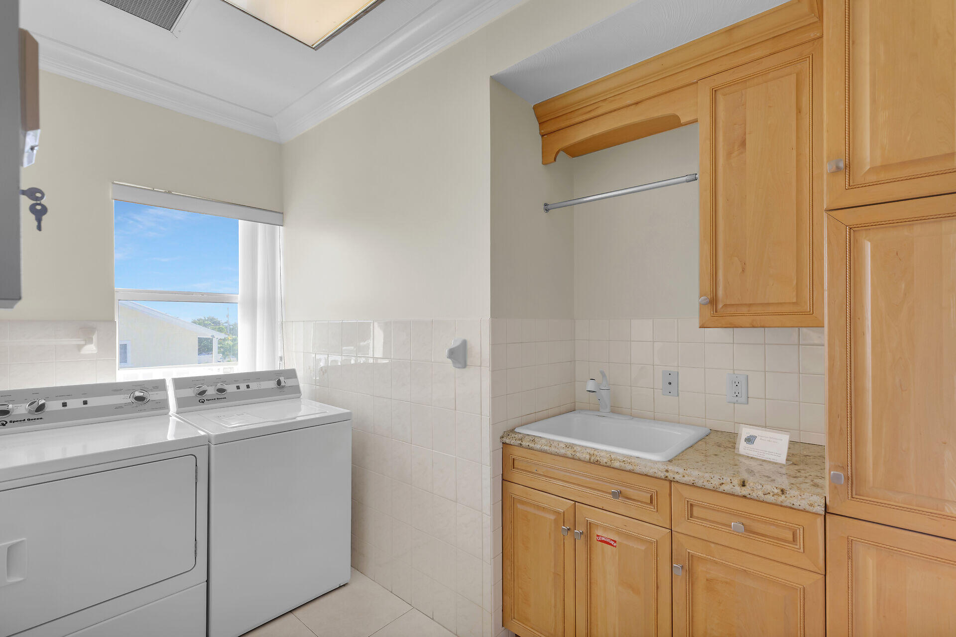 580-590 10th Street Key Colony Beach, FL 33051 - Photo 63 of 75 a utility room with a sink washer and dryer