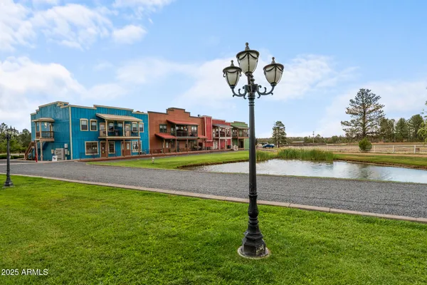 a view of a lake with a building in the background