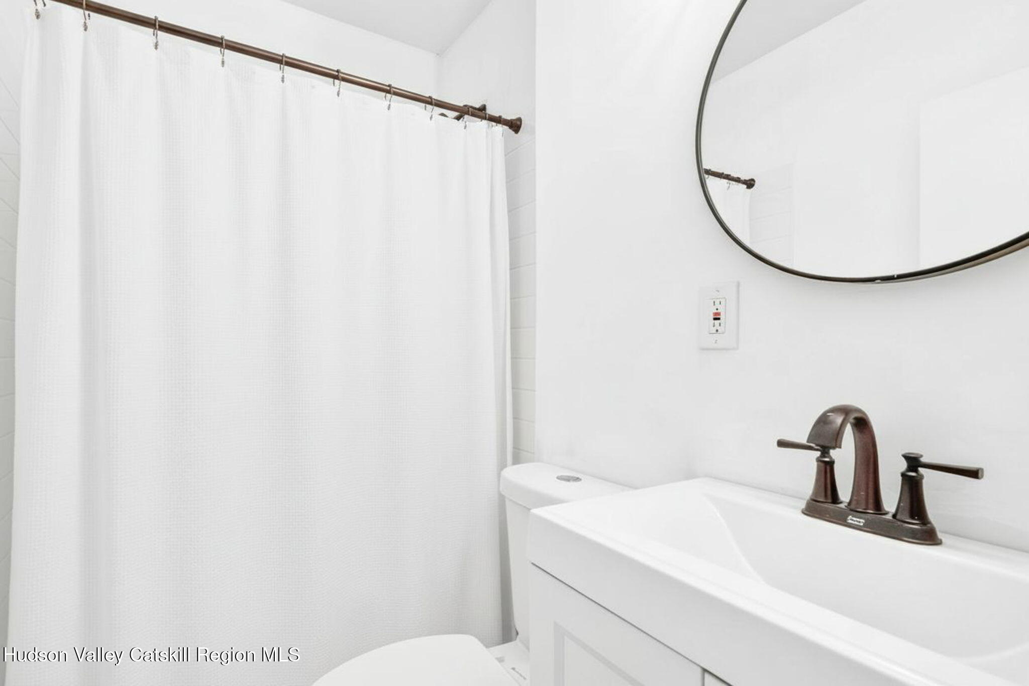 5 Lazy Brook Lane Woodstock, NY 12498 - Photo 28 of 35 a bathroom with a sink and a mirror