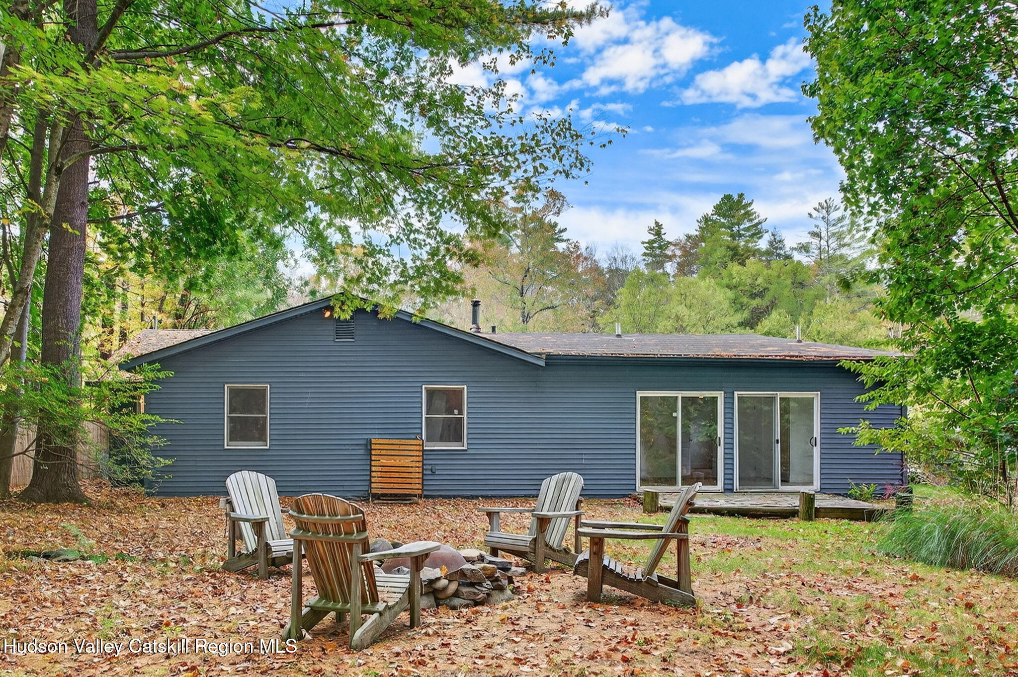5 Lazy Brook Lane Woodstock, NY 12498 - Photo 31 of 35 a backyard of a house with garden barbeque oven and outdoor seating