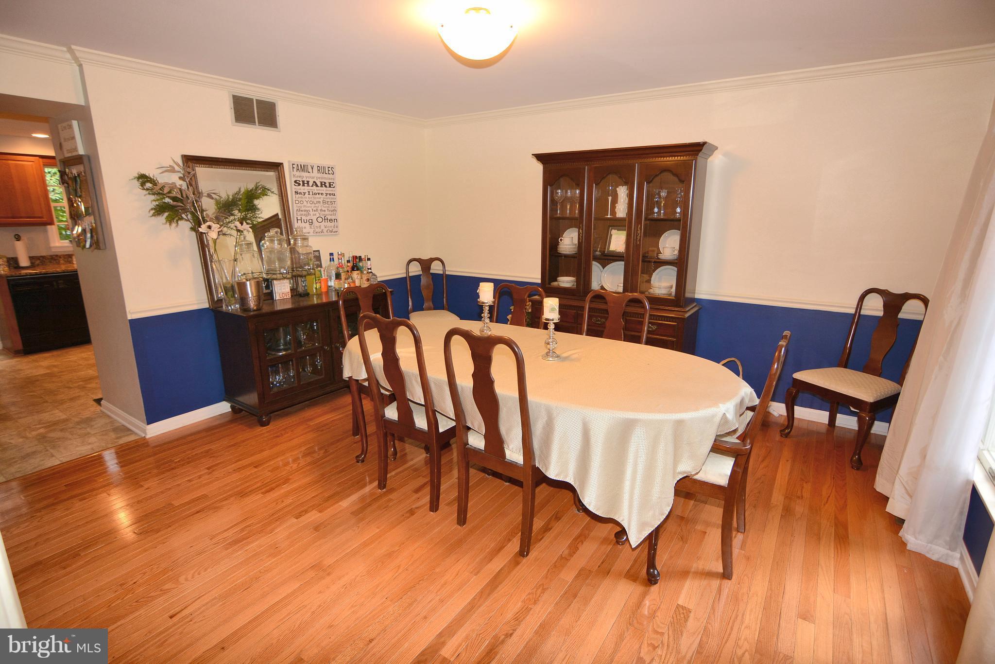 290 Locust Ridge Lane Arnold, MD 21012 - Photo 8 of 30 Spacious formal dining is adjacent to kitchen