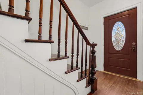 a view of stairs with wooden floor