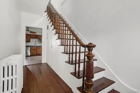 a view of entryway with wooden floor