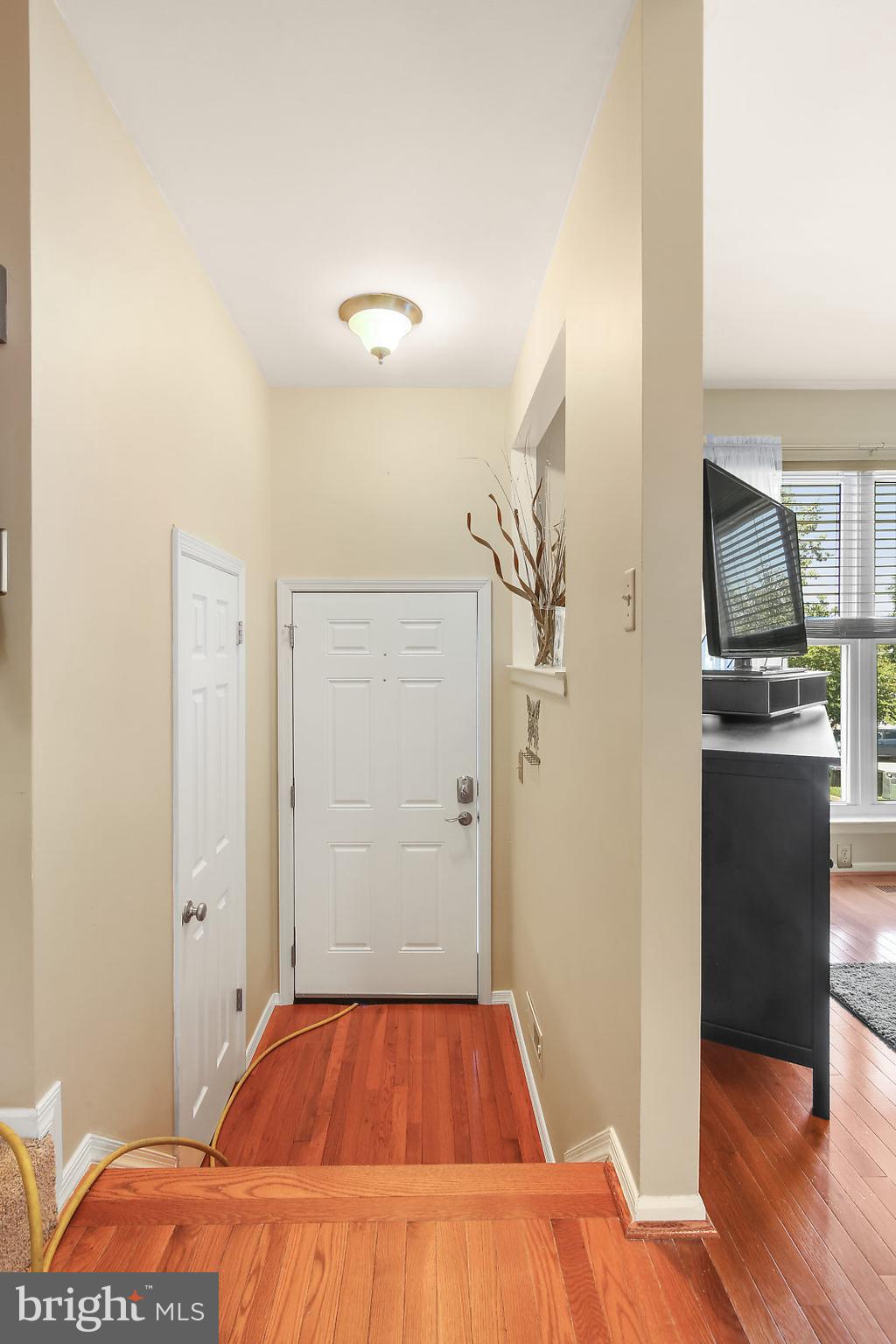 2053 Putnam Road Baltimore, MD 21227 - Photo 19 of 21 a room with a bed and a view of kitchen