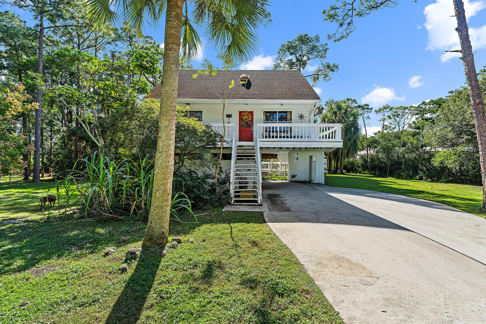 10390 Sandy Run Road Jupiter, FL 33478 - Photo 3 of 36 022-10390SandyRunRd-Jupiter-SMALL