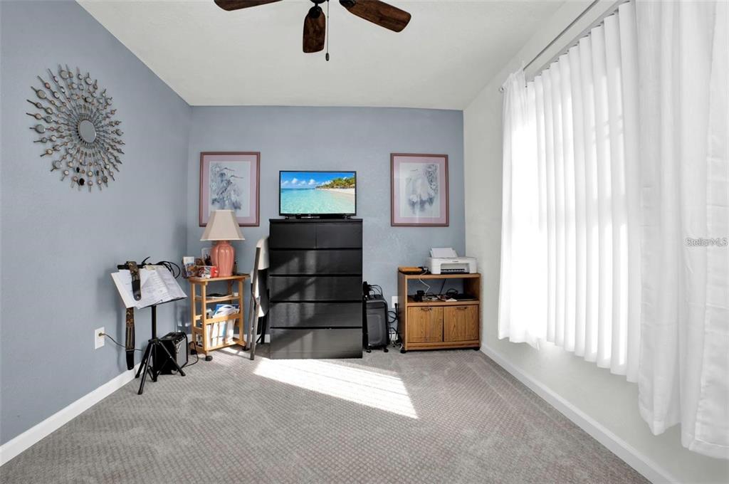 3520 Kenneth Road Port Charlotte, FL 33953 - Photo 15 of 43 a room with furniture and a window