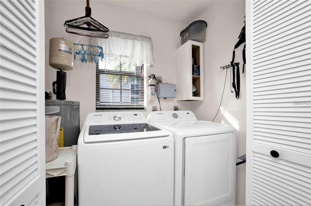 3520 Kenneth Road Port Charlotte, FL 33953 - Photo 22 of 43 a utility room with dryer and washer