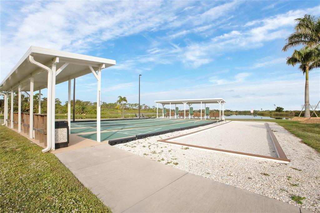 3520 Kenneth Road Port Charlotte, FL 33953 - Photo 33 of 43 a view of a swimming pool with a yard