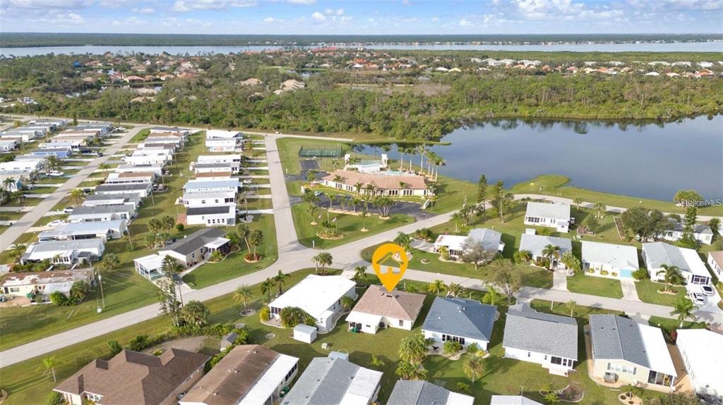3520 Kenneth Road Port Charlotte, FL 33953 - Photo 42 of 43 an aerial view of residential houses with outdoor space
