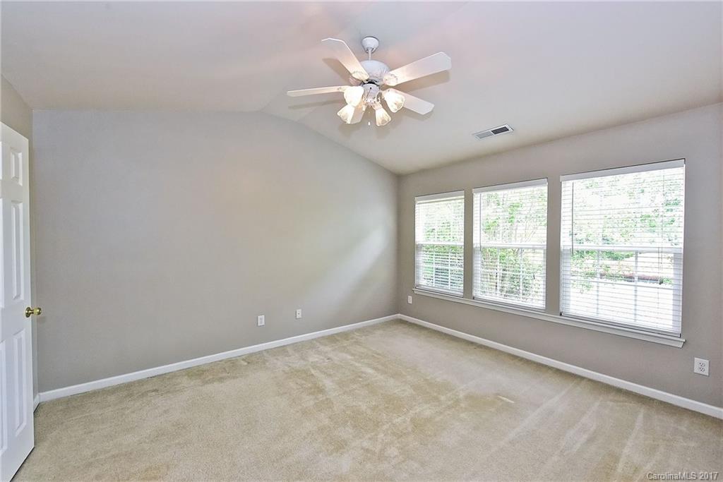 15319 McClure Bridge Road, Unit L90 Charlotte, NC 28277 - Photo 13 of 19 a view of an empty room with a window