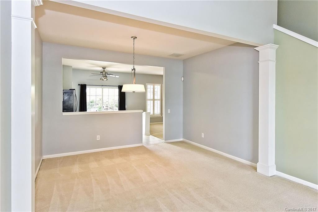 15319 McClure Bridge Road, Unit L90 Charlotte, NC 28277 - Photo 6 of 19 a view of a big room with windows and cabinet