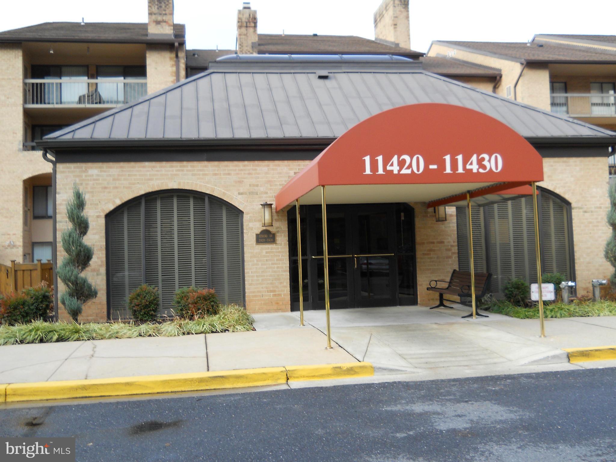 11430 Strand Drive, Unit R007 Rockville, MD 20852 - Photo 1 of 22 Front of Building