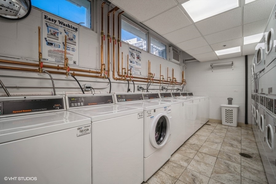8801 West Golf Road, Unit 10E Niles, IL 60714 - Photo 17 of 21 a utility room with dryer and washer