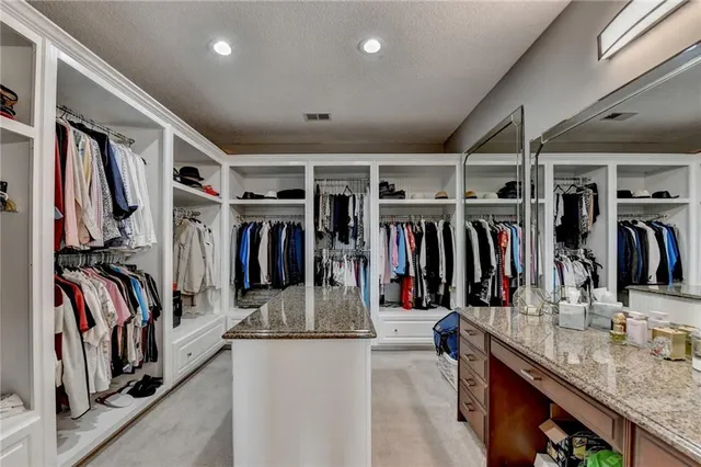 a room with furniture pool table and flat screen tv