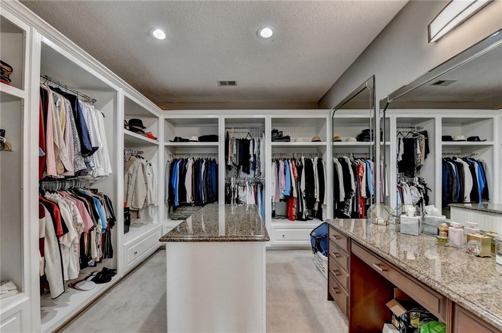 4420 Benefield Road Braselton, GA 30517 - Photo 21 of 34 a view of a walk in closet