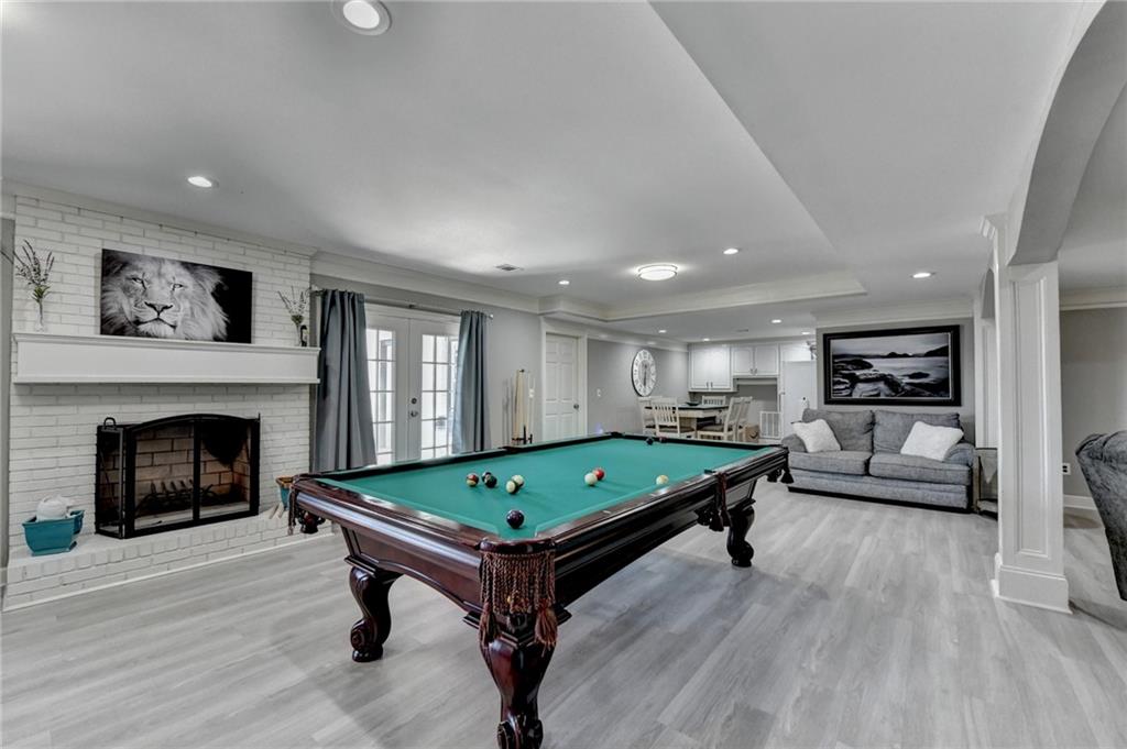 4420 Benefield Road Braselton, GA 30517 - Photo 23 of 34 a room with furniture pool table and flat screen tv