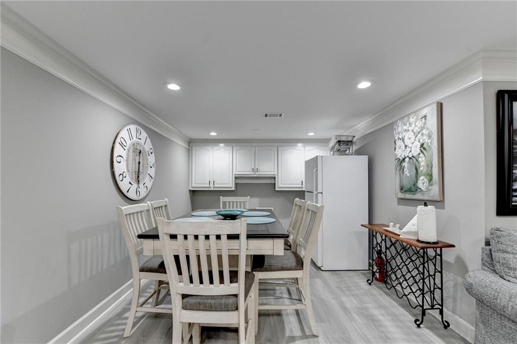 4420 Benefield Road Braselton, GA 30517 - Photo 25 of 34 a view of kitchen with furniture wooden floor and window