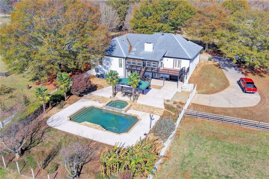 4420 Benefield Road Braselton, GA 30517 - Photo 32 of 34 a view of a house with a yard