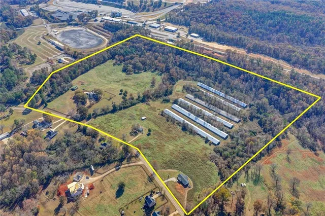 a view of water pond with yard