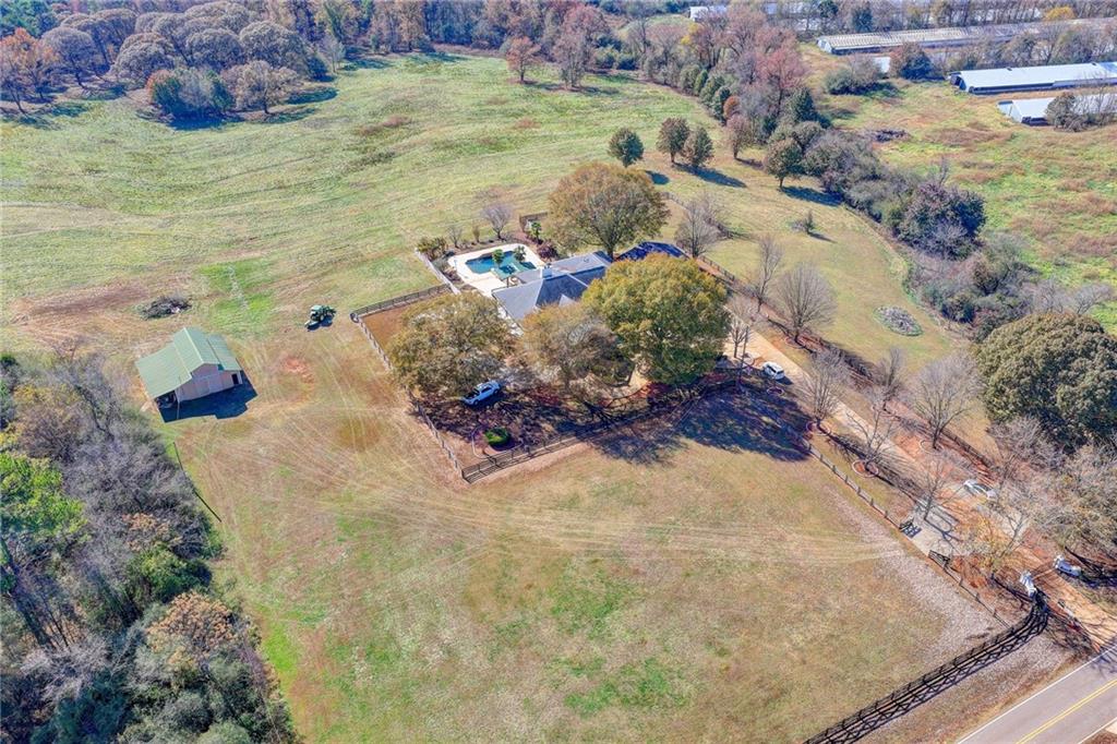 4420 Benefield Road Braselton, GA 30517 - Photo 5 of 34 a view of water pond with yard