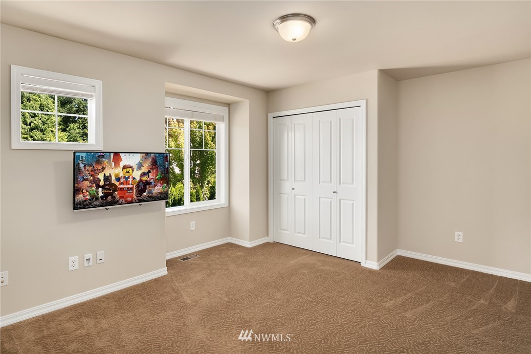 3930 215th Street Southeast Bothell, WA 98021 - Photo 29 of 35 an empty room with windows