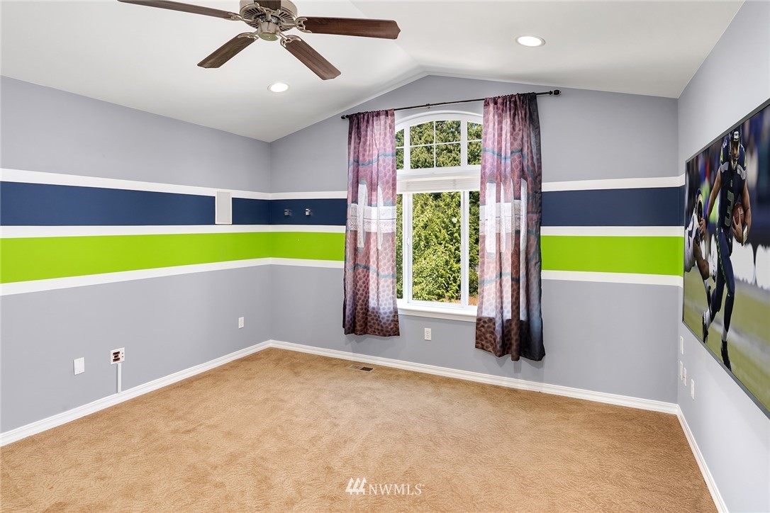 3930 215th Street Southeast Bothell, WA 98021 - Photo 32 of 35 a view of an empty room with a window