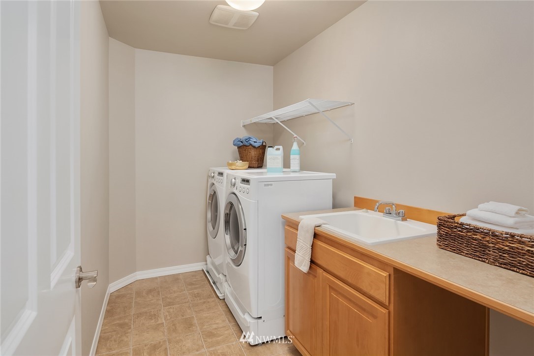 3930 215th Street Southeast Bothell, WA 98021 - Photo 33 of 35 a utility room with dryer and washer