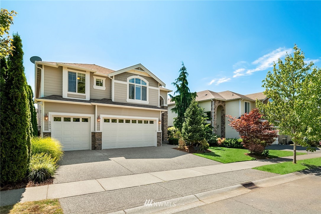 3930 215th Street Southeast Bothell, WA 98021 - Photo 35 of 35 a front view of house with yard and green space