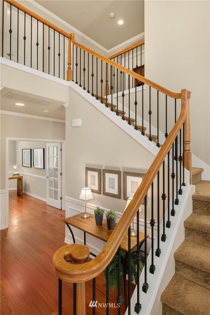 3930 215th Street Southeast Bothell, WA 98021 - Photo 5 of 35 a view of entryway and hall with wooden floor