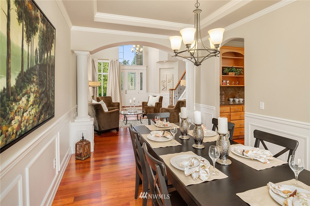 3930 215th Street Southeast Bothell, WA 98021 - Photo 8 of 35 a view of a dining room with furniture wooden floor and chandelier