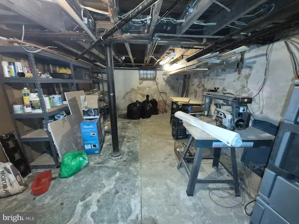 a view of a chairs and table in a room