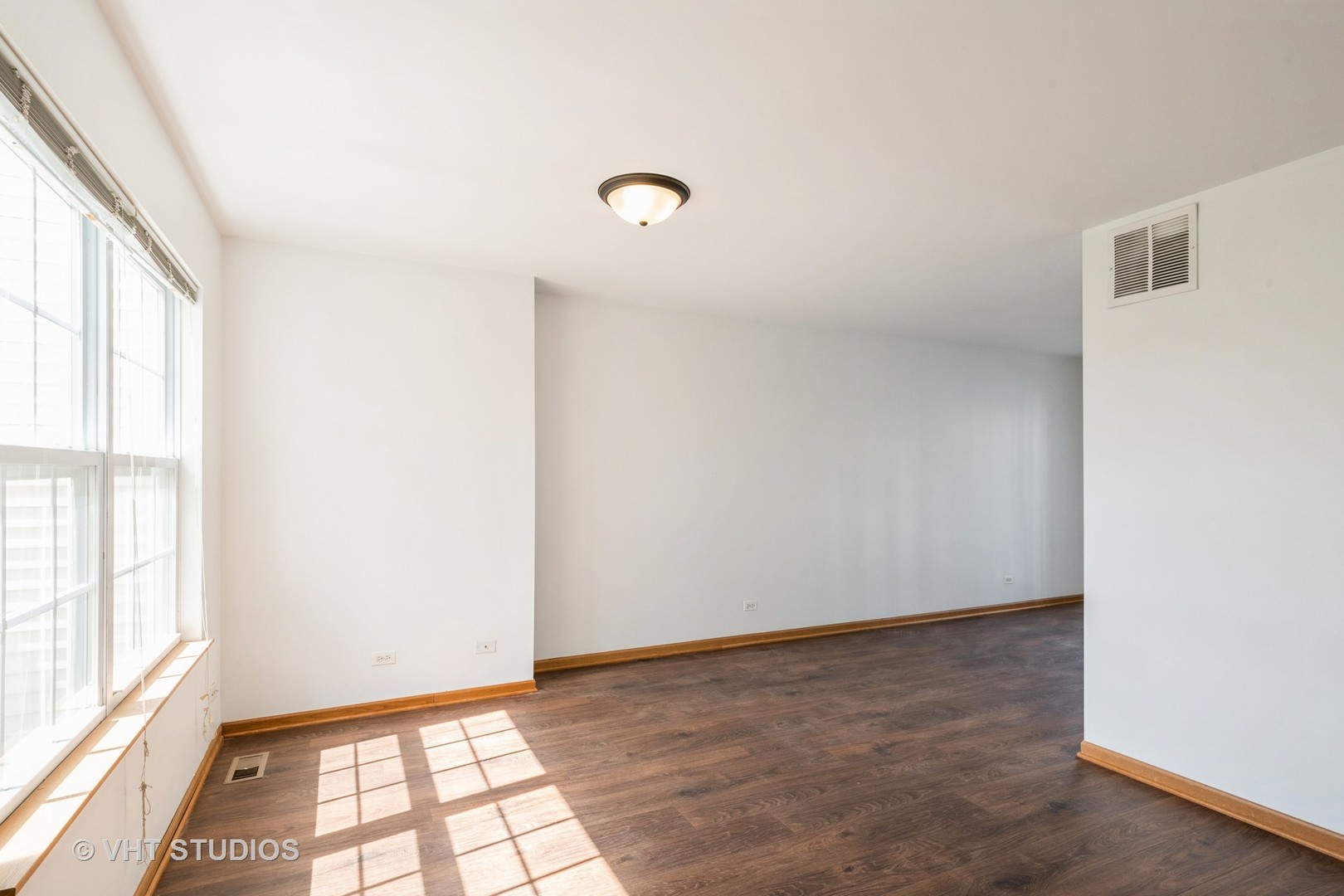 34296 North Barberry Road Round Lake, IL 60073 - Photo 2 of 10 a view of an empty room with a window