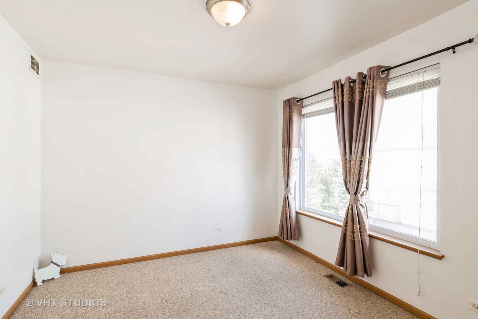 34296 North Barberry Road Round Lake, IL 60073 - Photo 7 of 10 a view of an empty room with a window