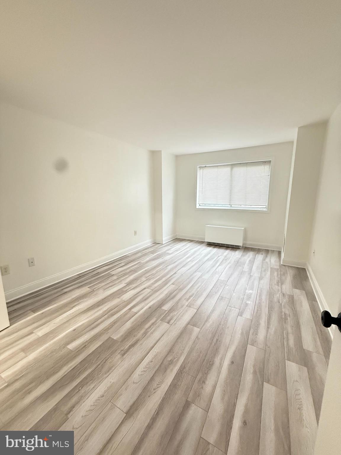 2059 Huntington Avenue, Unit 111 Alexandria, VA 22303 - Photo 19 of 34 a view of empty room with wooden floor