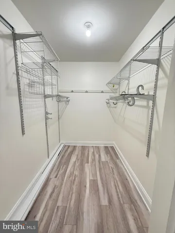 a view of a room with racks on the wall