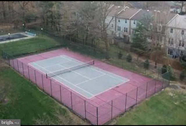 a view of a backyard with jacuzzi