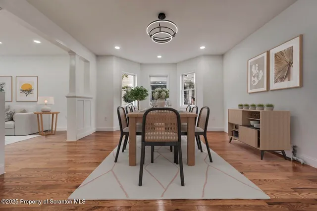 a kitchen with stainless steel appliances a refrigerator sink and cabinets