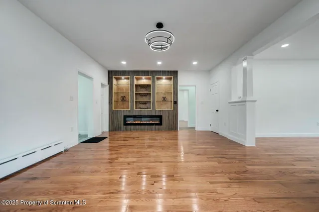 a bathroom with a toilet sink and a shower