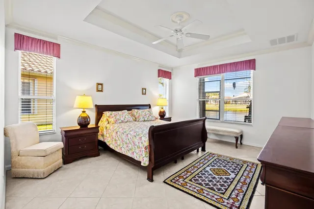 a bathroom with a glass shower door and a glass door