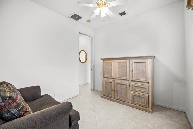 a large tree in front of a house