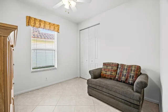 a view of a lake with houses in the back