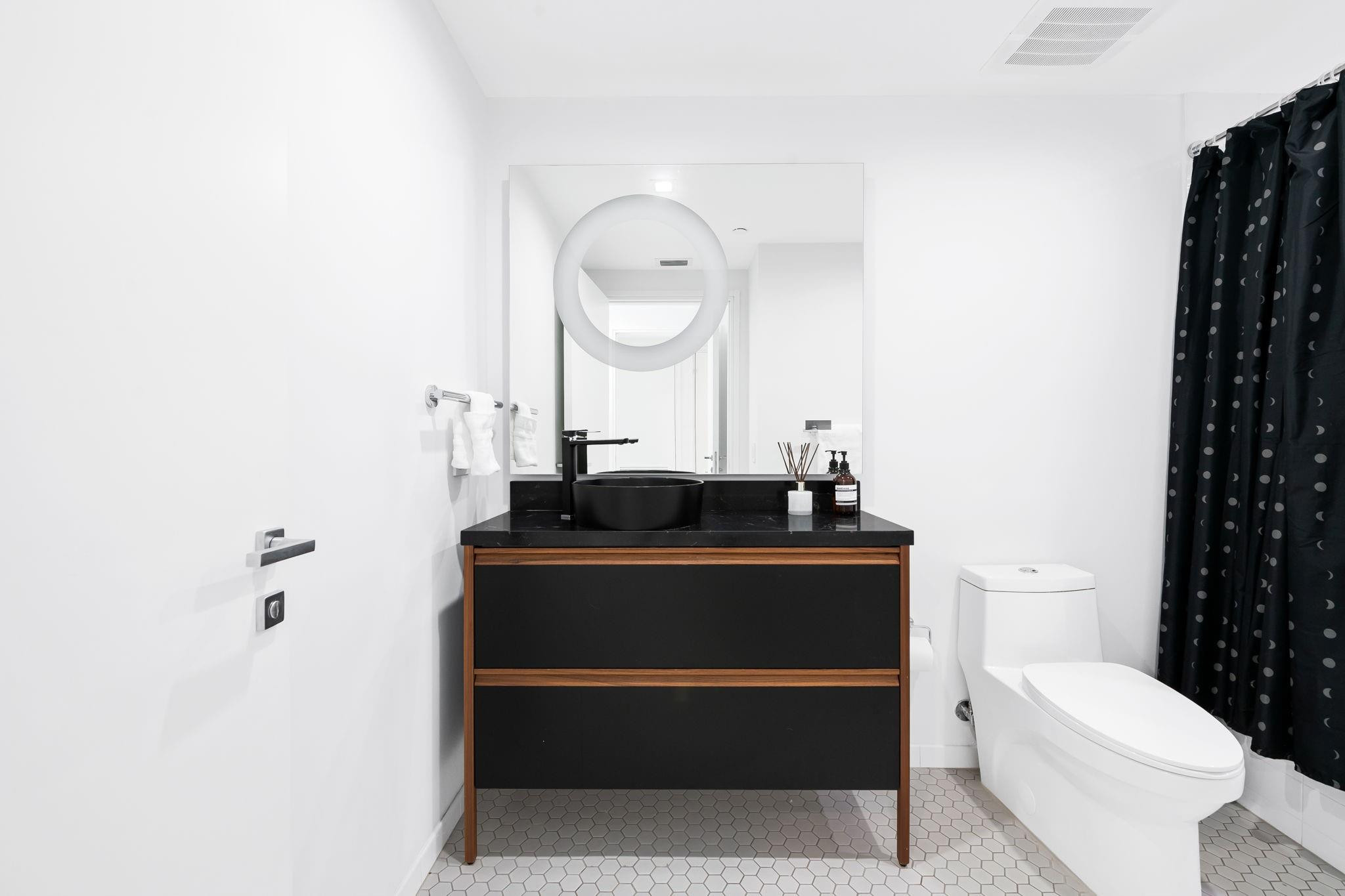 401 North Birch Road, Unit 1100 Fort Lauderdale, FL 33304 - Photo 14 of 30 a view of hallway with toilet