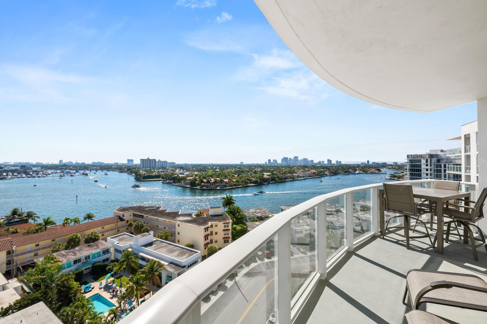 401 North Birch Road, Unit 1100 Fort Lauderdale, FL 33304 - Photo 2 of 30 a view of a lake with couches and city view